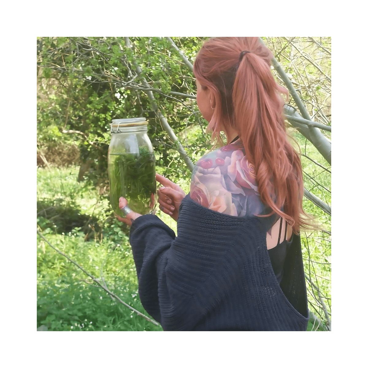 Karen preparing herbal tinctures